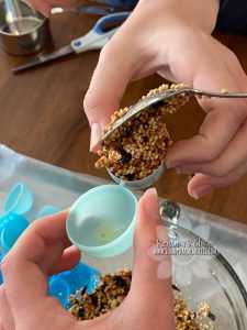 Packing One Side of Birdseed Egg